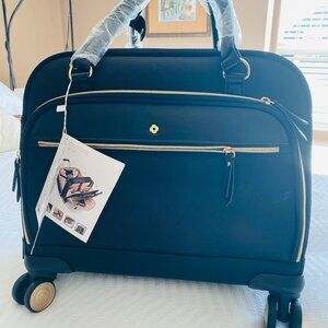 Mobile Office carry-on spinner. Lightweight, waterproof pol-vinyl.